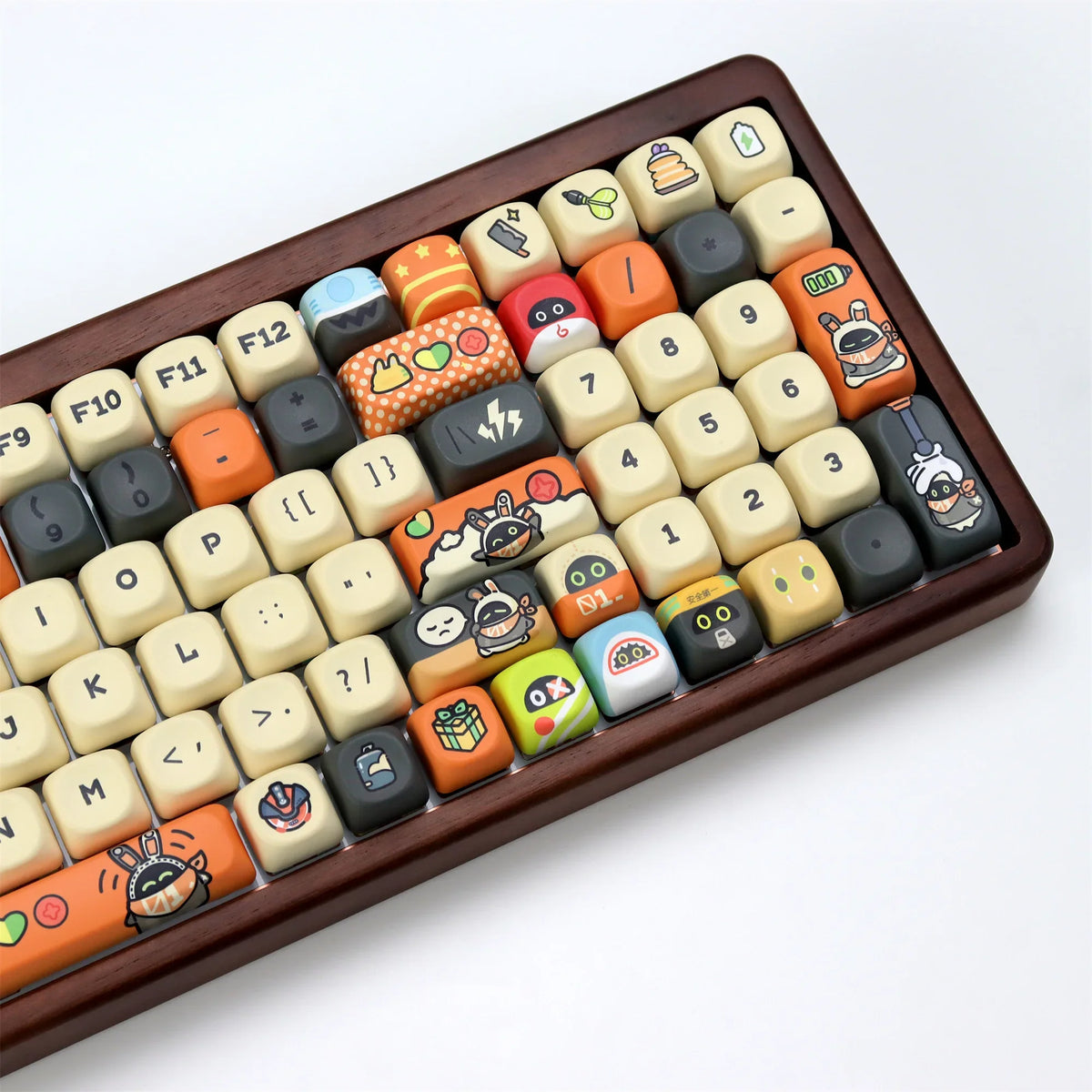 A tray of PBT keycaps for a mechanical keyboard in the KOA profile, featuring various colors and designs.