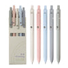 A set of Morandi piloting gel pens in various colors, including pink, blue, and gray.