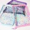 A set of transparent zipper photo binders in purple and pink, featuring glittery star patterns.