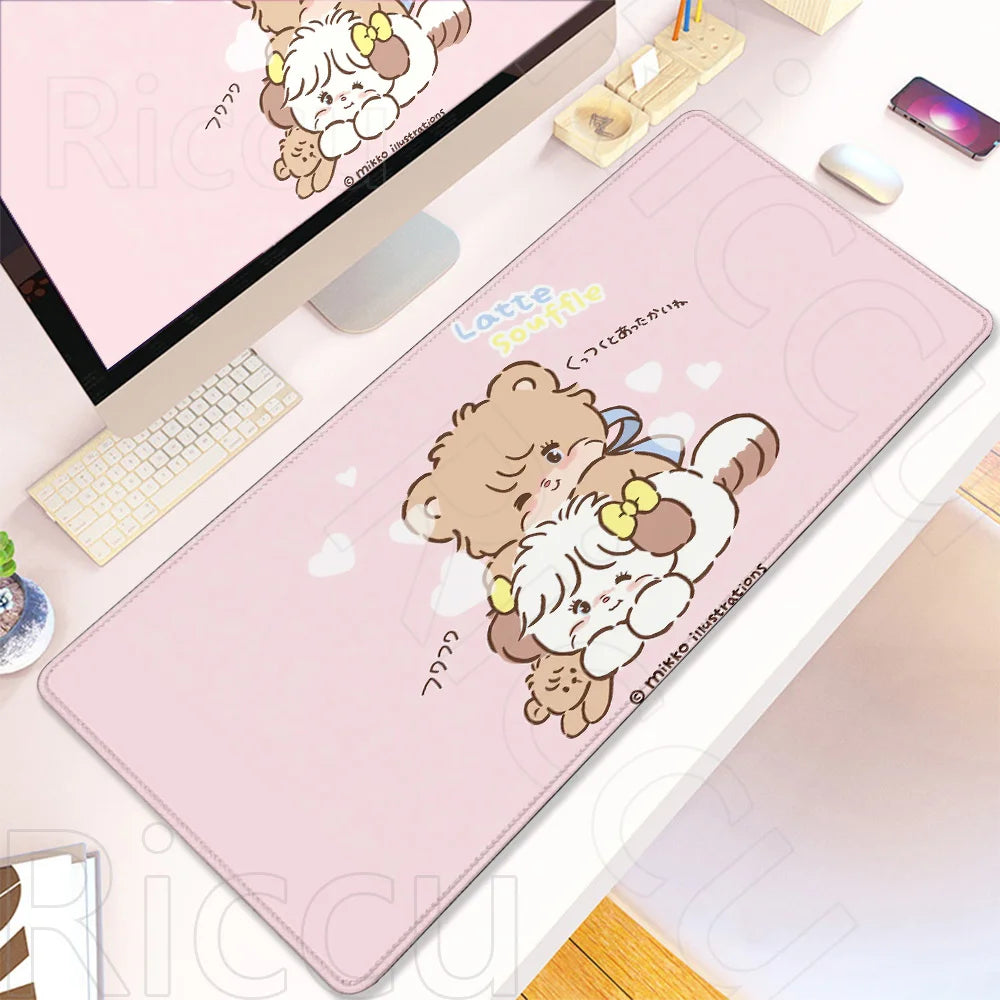 A pink cartoon gaming desk mat featuring a cute teddy bear and a fluffy white animal design.