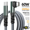 A close-up view of a green USB-C fast charging and data cable with a braided black jacket.