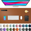 A large brown PU leather desk mat featuring a laptop, keyboard, mouse, and a smartphone.
