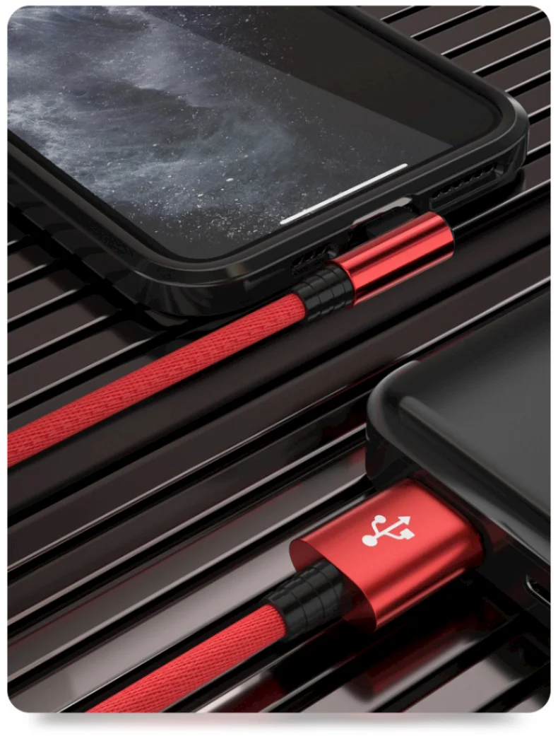 A red and black braided Lightning cable for iPhone is shown resting on a dark surface.