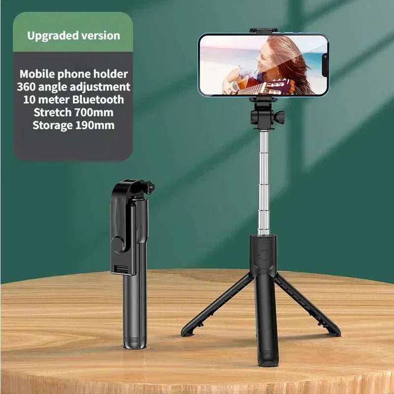 A black mobile phone holder tripod with an attached phone and a smartphone display in a green background.