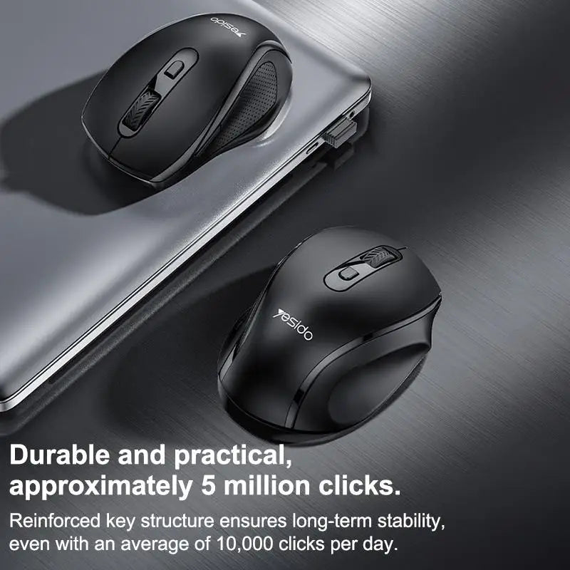 A black ergonomic wireless mouse is shown resting on a silver laptop, highlighting its durable key structure.