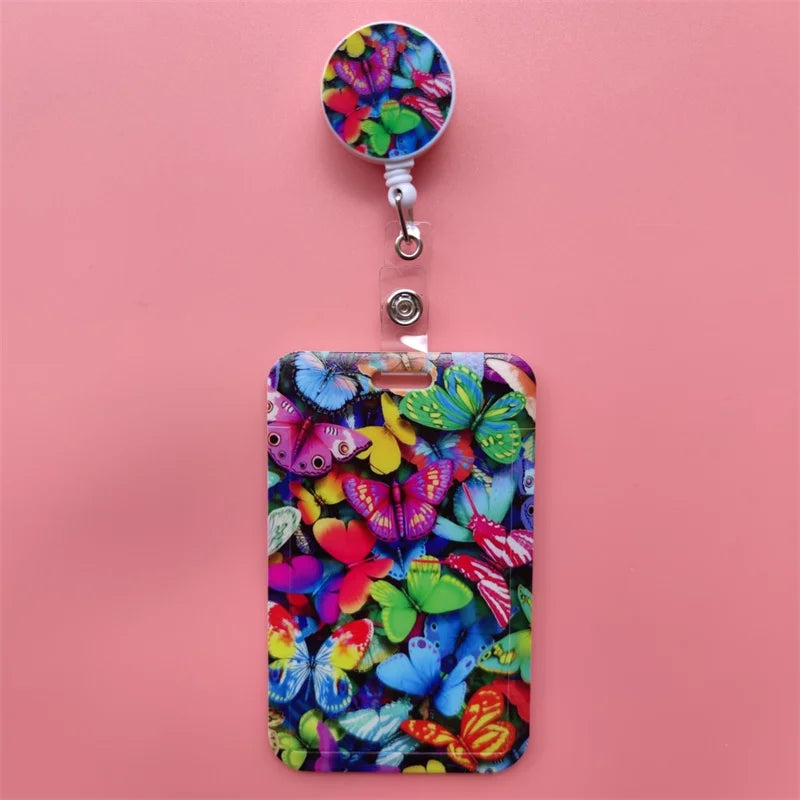 A colorful leopard print card holder clip featuring vibrant butterfly designs.