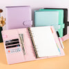 A set of pastel colored PU leather binder notebooks and a pink notebook with ID card inserts.