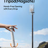 A hand is holding a Ulanzi automatic phone tripod, demonstrating its hands-free opening feature outdoors.