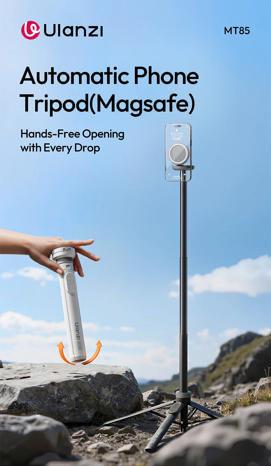 A hand is holding a Ulanzi automatic phone tripod, demonstrating its hands-free opening feature outdoors.