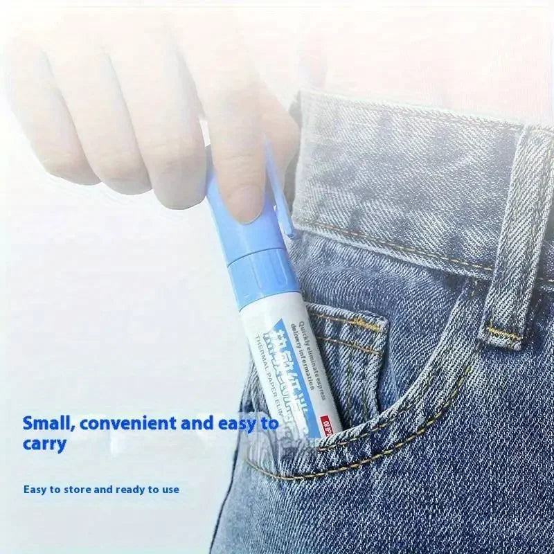 A hand is shown placing a small blue thermal paper eraser into the pocket of denim jeans.