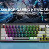 A close-up view of a compact 68-key RGB gaming keyboard with various colored keys and a silver frame.