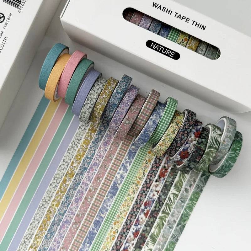 A collection of colorful nature-themed washi tape strips in various patterns and colors displayed next to its packaging.