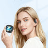 A woman holds a compact black True Wireless Bluetooth earphone against her ear, demonstrating its portability.