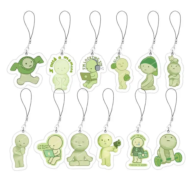 A set of acrylic Smiski-inspired phone charm keychains featuring various green, humanoid characters.
