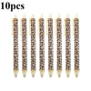 Ten leopard print retractable ballpoint pens with black ink.