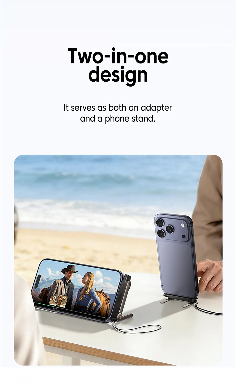 A two-in-one adapter serves as both a phone stand and an adapter, shown next to a smartphone on a table.