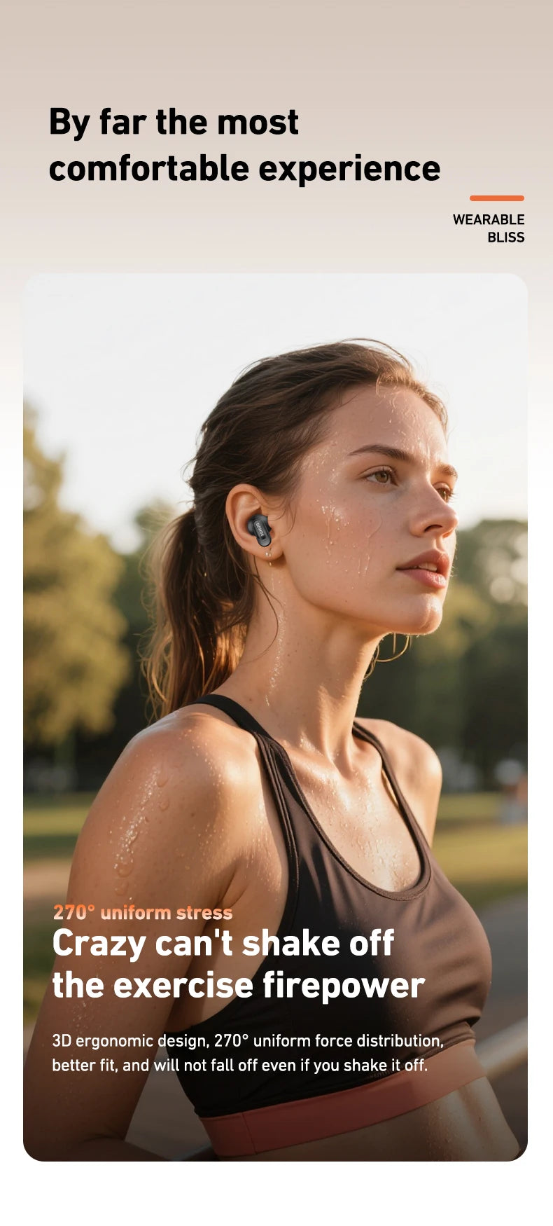 A woman wearing a black athletic top and a tan strap from a wearable fitness device, outdoors.