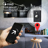 A hand holds a smartphone displaying an app interface for finding a wallet, with a leather wallet shown nearby.