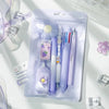 A clear plastic pouch containing a set of cute cartoon school stationery including a purple eraser and pens.