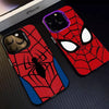 A red Spider-Man themed phone case featuring a black spider design and white eyes, displayed on a dark surface.