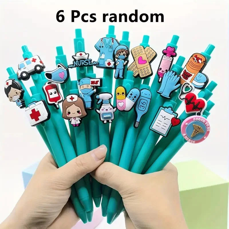 A hand holds a bundle of six medical theme ballpoint pens featuring various nurse and first aid icons.