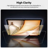 Close-up view of a clear tempered glass screen protector being applied to an iPad screen.