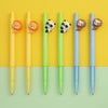 A set of three cute mechanical pencils featuring mini animal designs in orange, green, and blue.