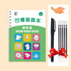A green notebook with plant drawings and a set of black drawing pens.
