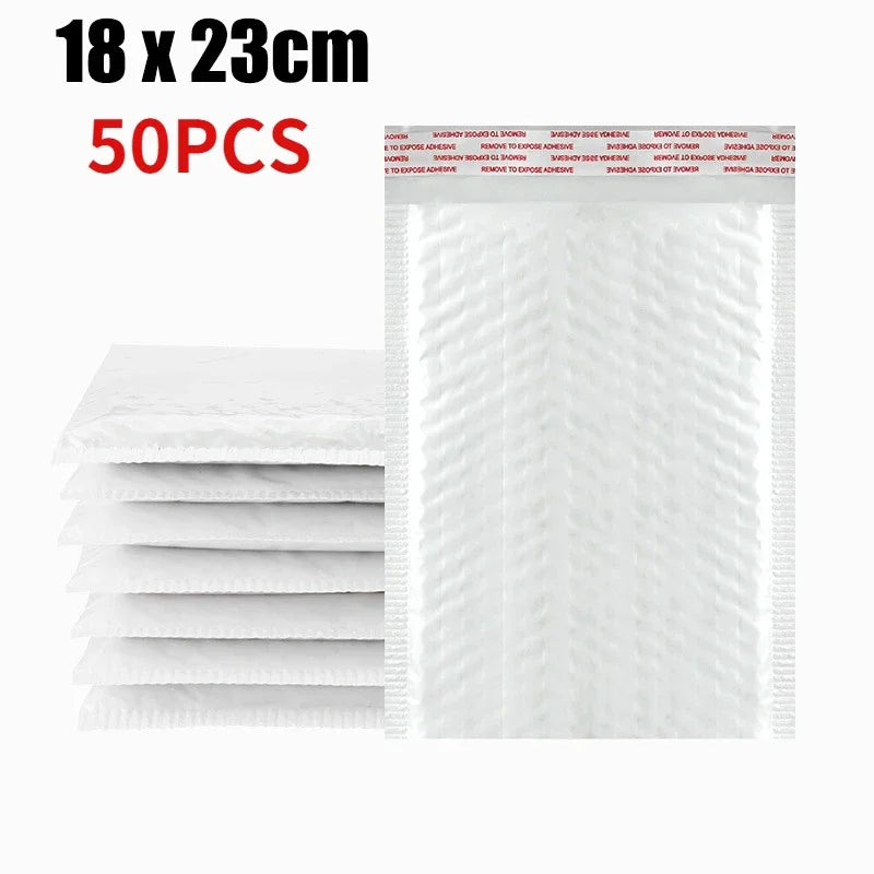 A stack of 50 self-sealing pearl film bubble shipping bags, measuring 18 x 23 cm each.