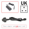 Black power adapter and UK power cord for laptops