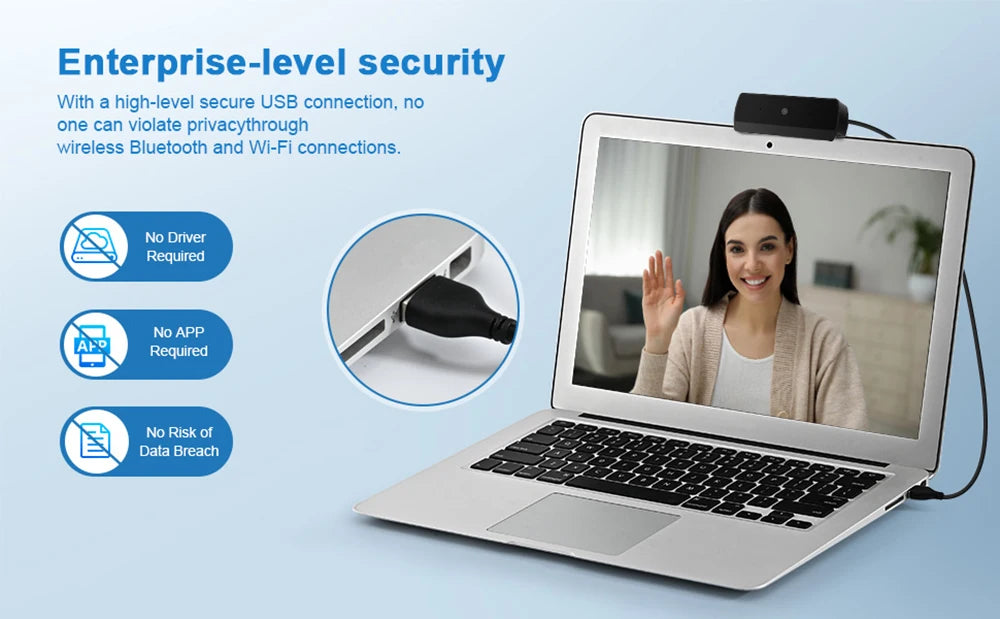 A laptop displaying a woman on a video call, with icons indicating enterprise-level security features.