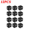 Twelve black magnetic cable clips arranged in a row for desk organization.