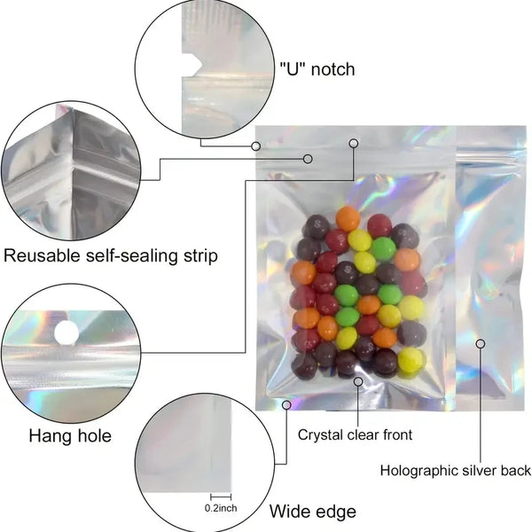 A holographic silver bag containing colorful crystals, featuring a U notch, hang hole, and wide edge.