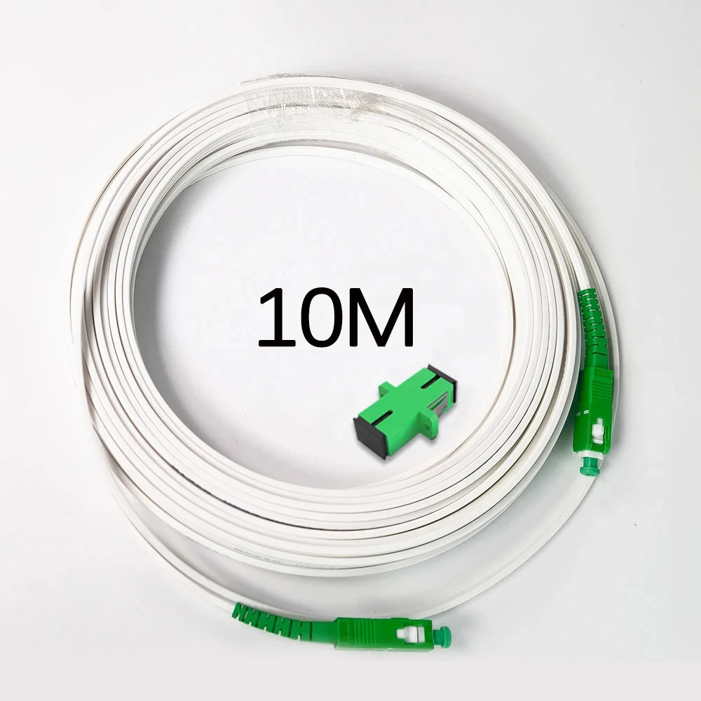 A coil of white single-mode fiber optic cable with green connectors is shown on a white background.