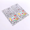 A sheet of rectangular thank you gift stickers featuring various doodle-style letters and symbols.
