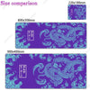 A purple gaming desk mat featuring a detailed blue dragon design and Japanese text.