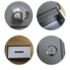A set of components for a classic book-shaped piggy bank including a lock, key, and the main body.