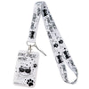 White card holder lanyard featuring a cartoon cat design with paw prints and text