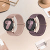 A pair of rose gold braided loop watch bands for Garmin devices shown on a light background.