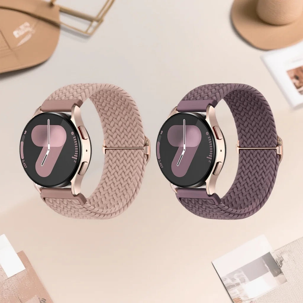 A pair of rose gold braided loop watch bands for Garmin devices shown on a light background.