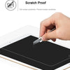 A hand uses a metal tool to apply a scratch proof tempered glass screen protector onto an iPad display.