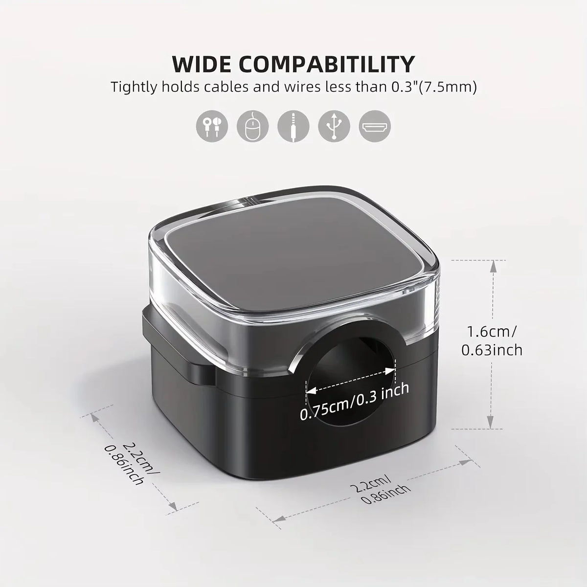 A black magnetic cable management clip with a clear lid shown on a white background.