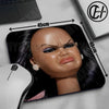 A close-up of a doll face mouse pad featuring a realistic portrait with a rubber non-slip base.