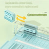 A close-up view of a manual paper cutter with an interchangeable blade, showing the replacement mechanism and cutting surface
