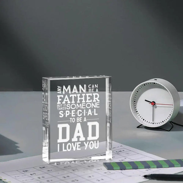A clear glass keepsake box with engraved text that reads Any man can be a father but it someone special to be a dad I love yo