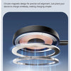 A close-up view of a magnetic wireless charging coil assembly with multiple rings and a charging pad below.