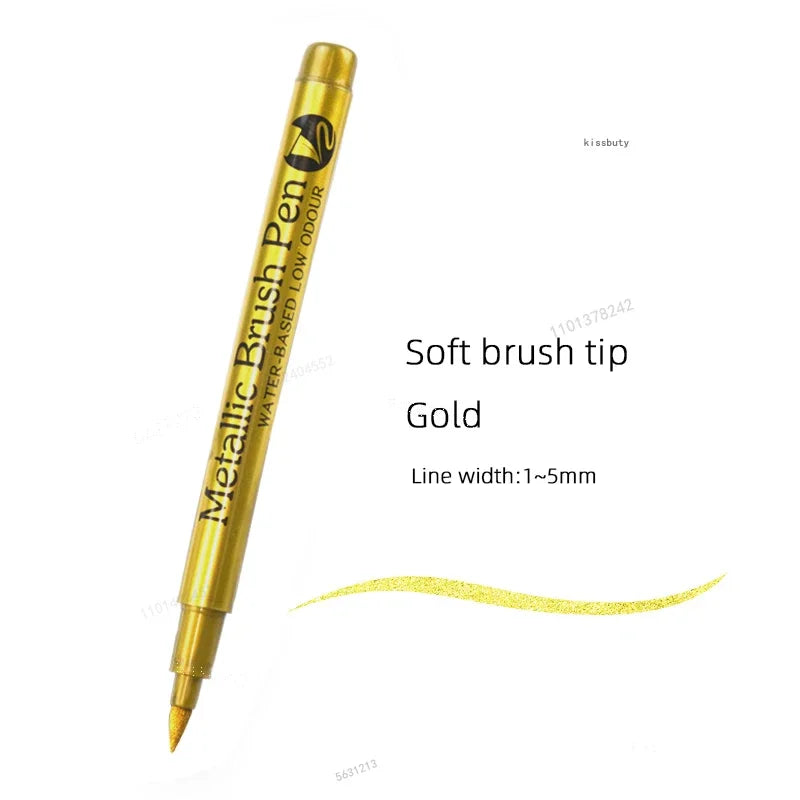 A gold metallic brush pen with a soft tip is shown next to a gold glitter line.