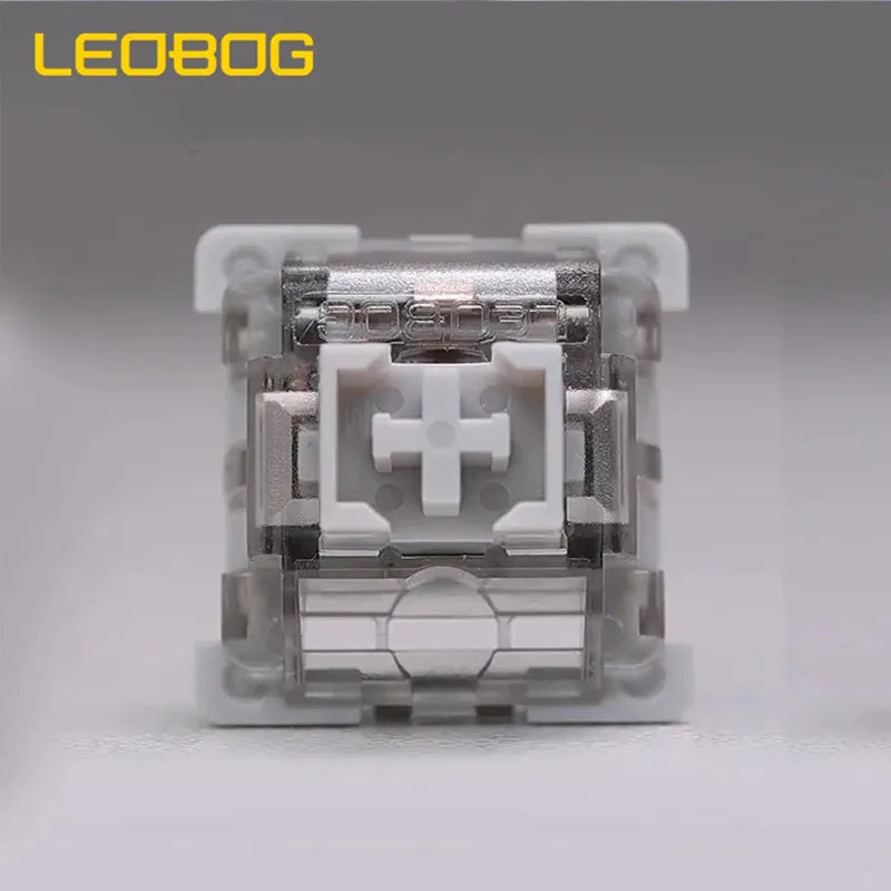 A close-up view of a gray mechanical keyboard switch housing for hot-swap keyboards.
