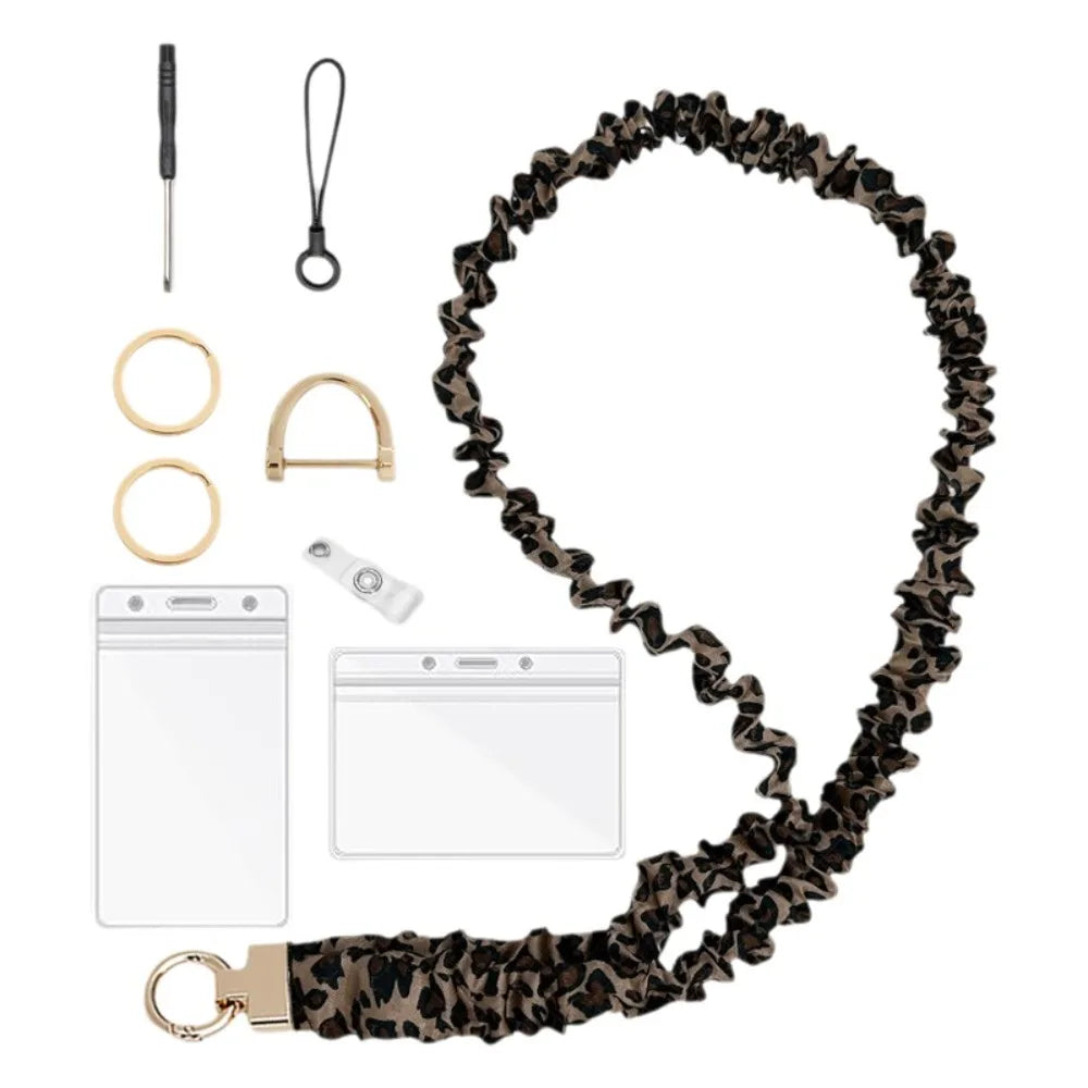 A black leopard print stretchy breakaway ID badge lanyard with a retractable reel and clip.