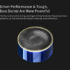 A close-up view of a blue and black driver cone on a headphone, highlighting the speaker component.